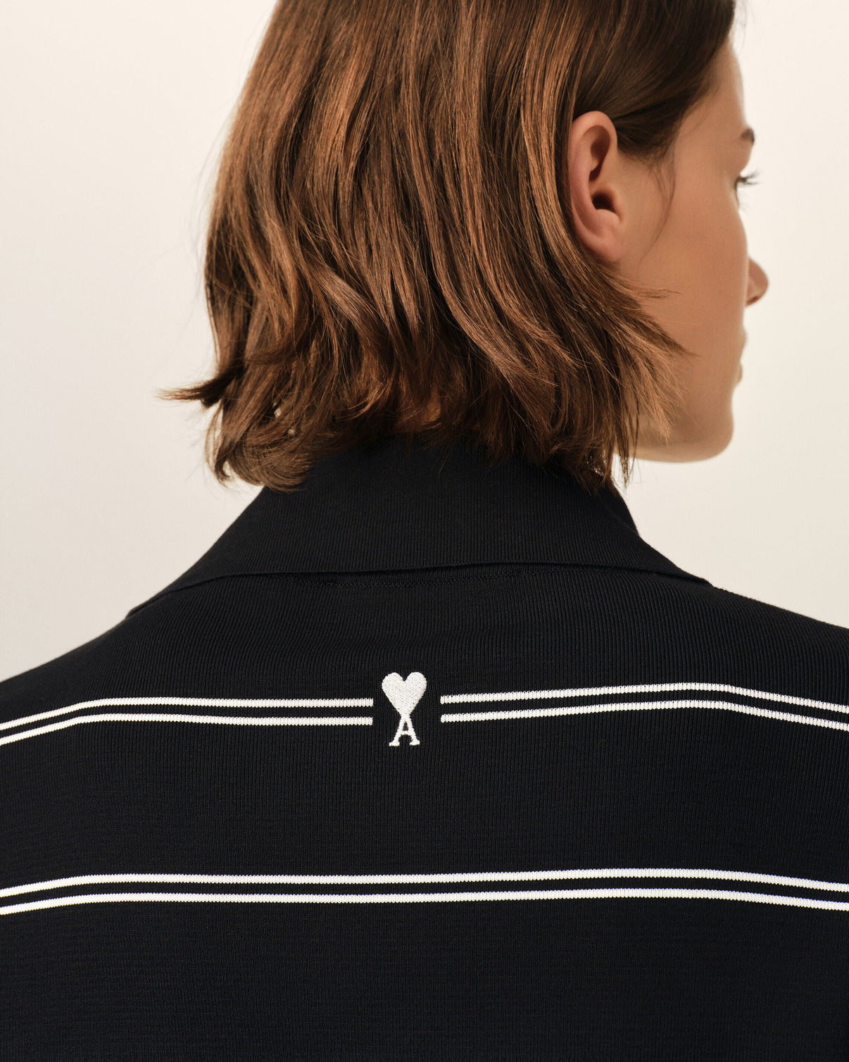 Black striped cotton polo with patch