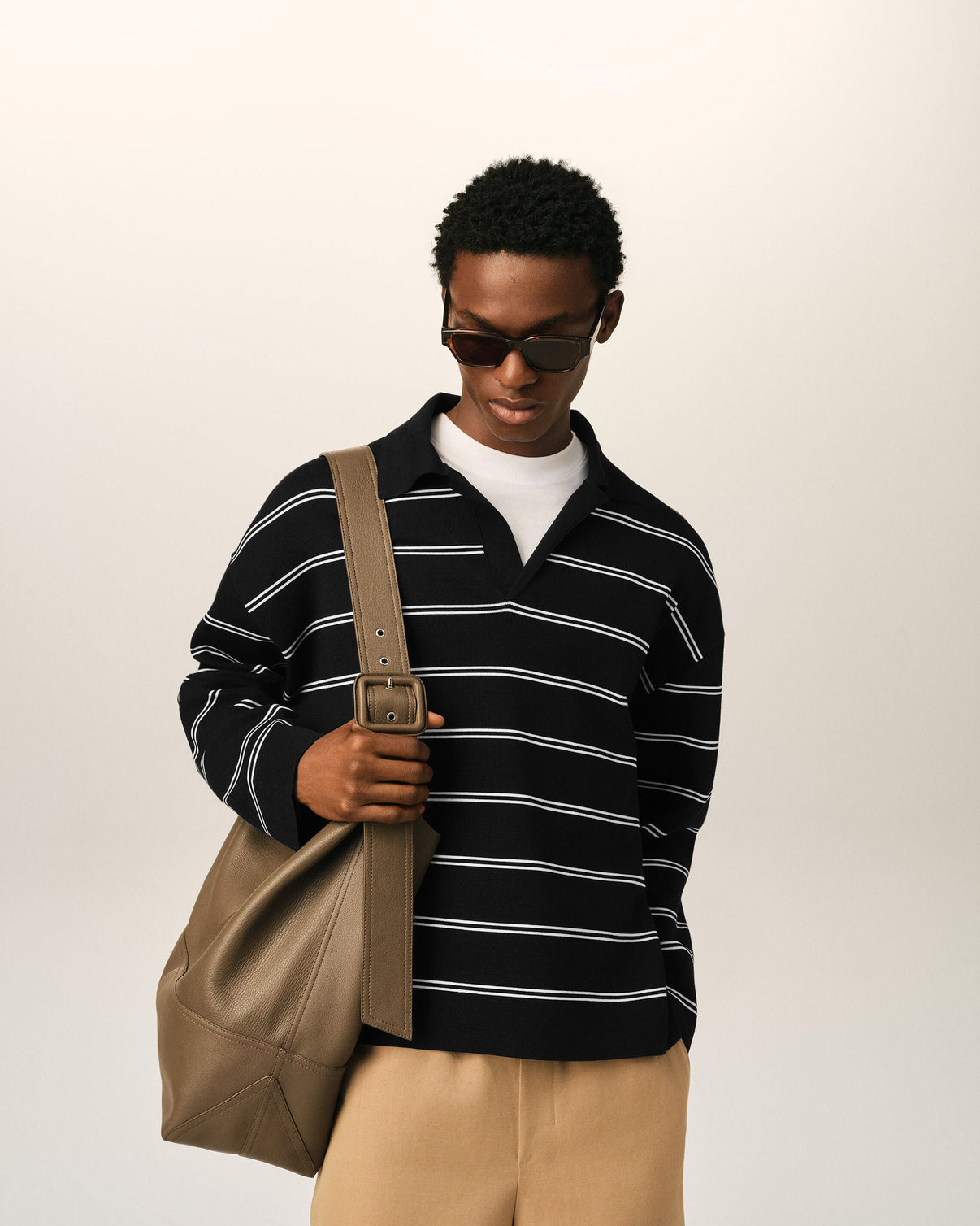 Black striped cotton polo with patch