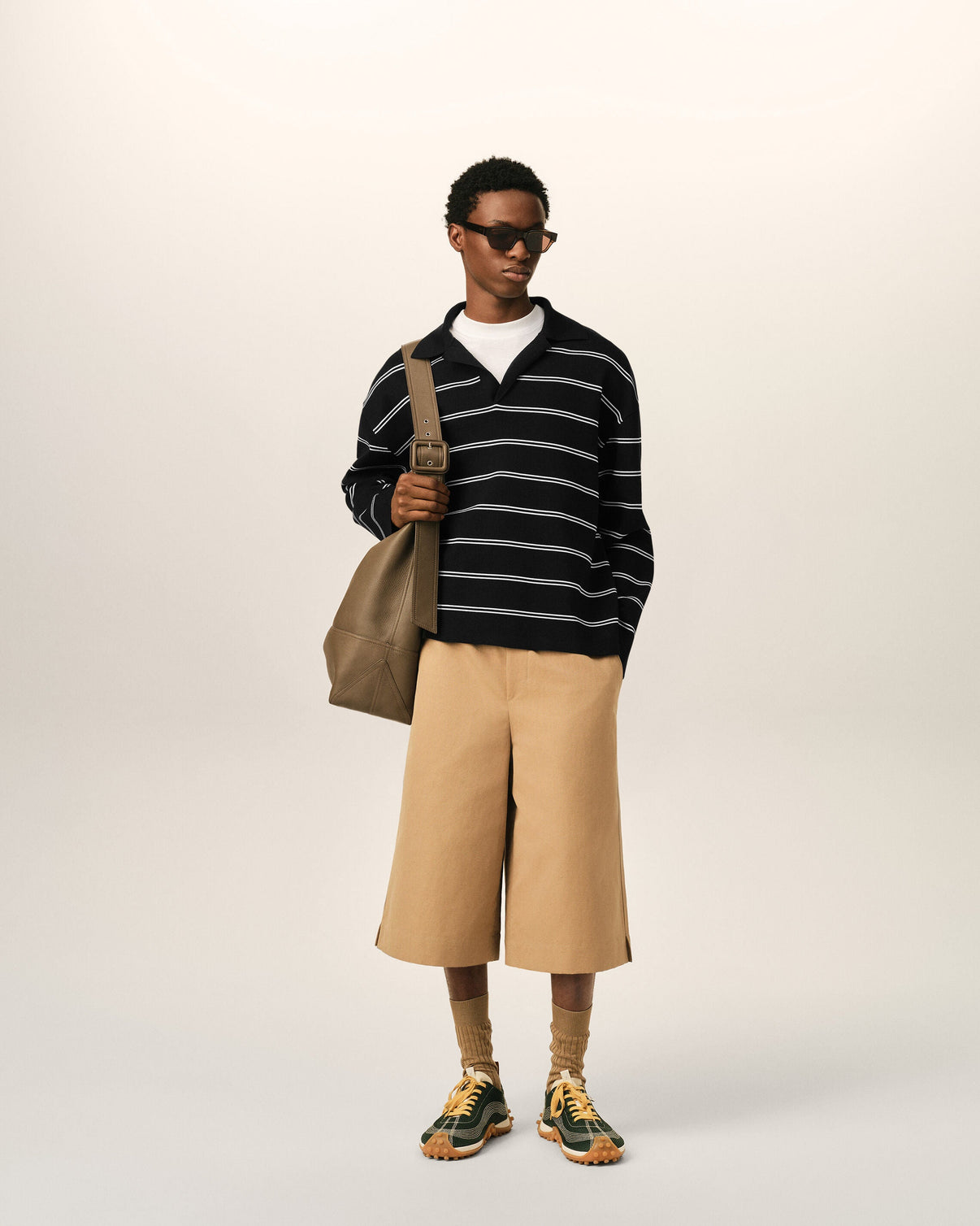 Black striped cotton polo with patch