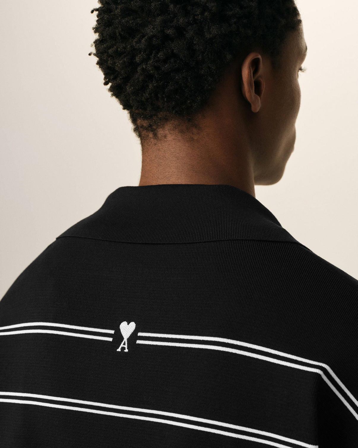 Black striped cotton polo with patch
