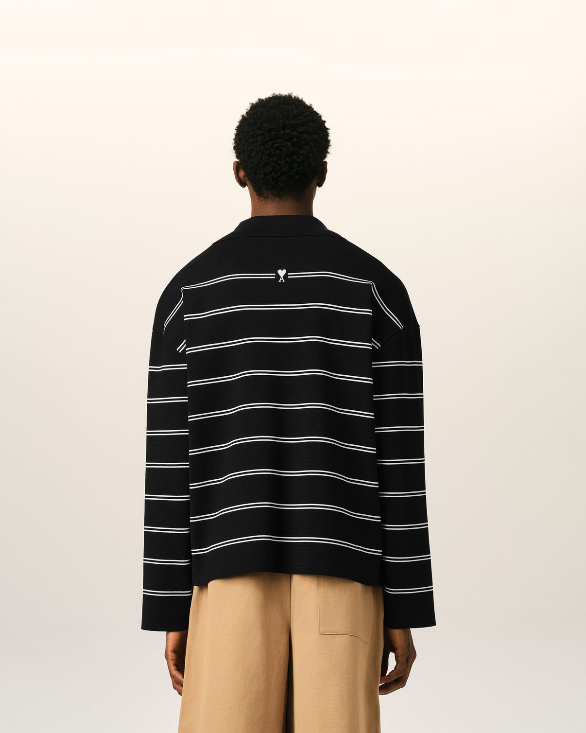 Black striped cotton polo with patch