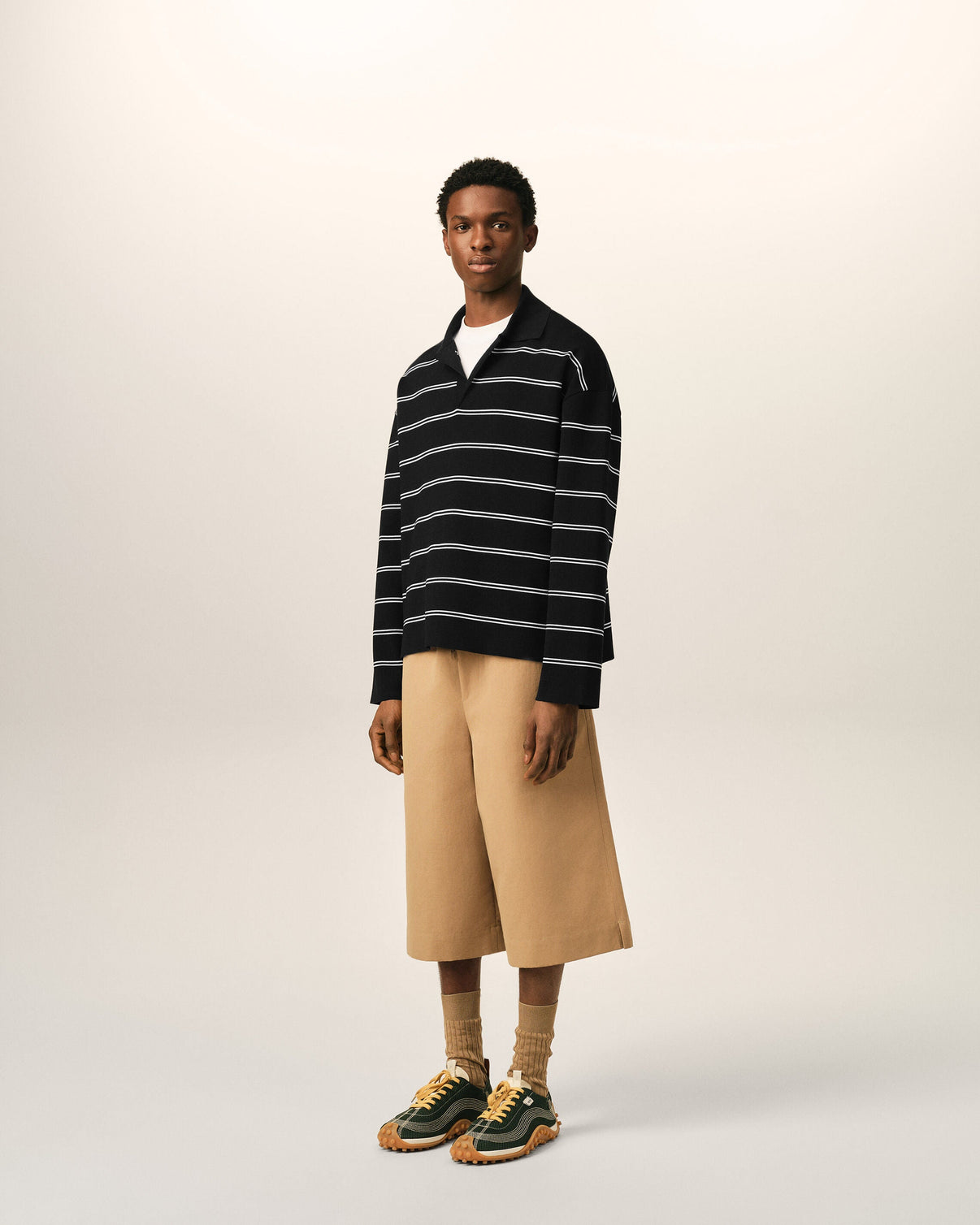 Black striped cotton polo with patch