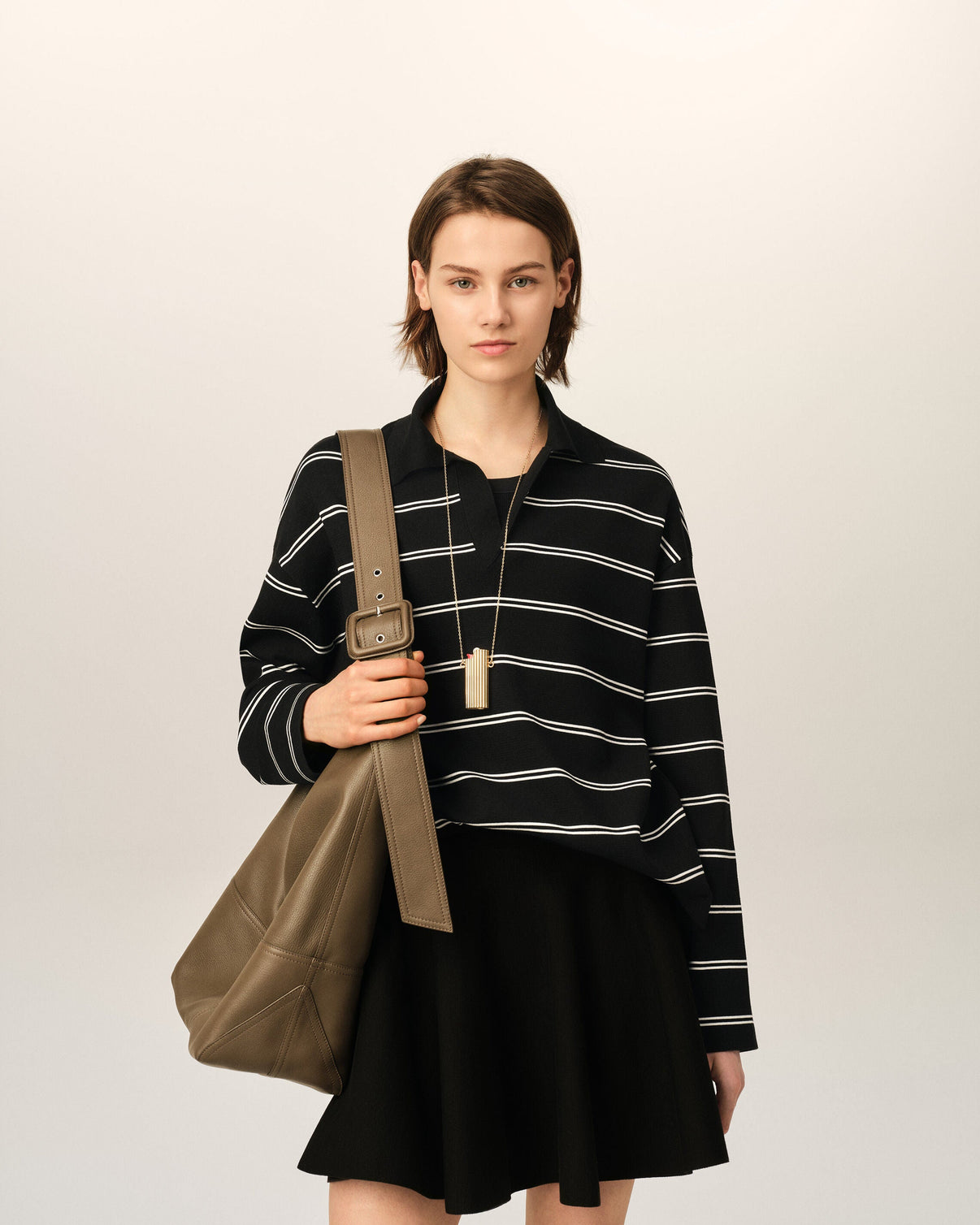 Black striped cotton polo with patch