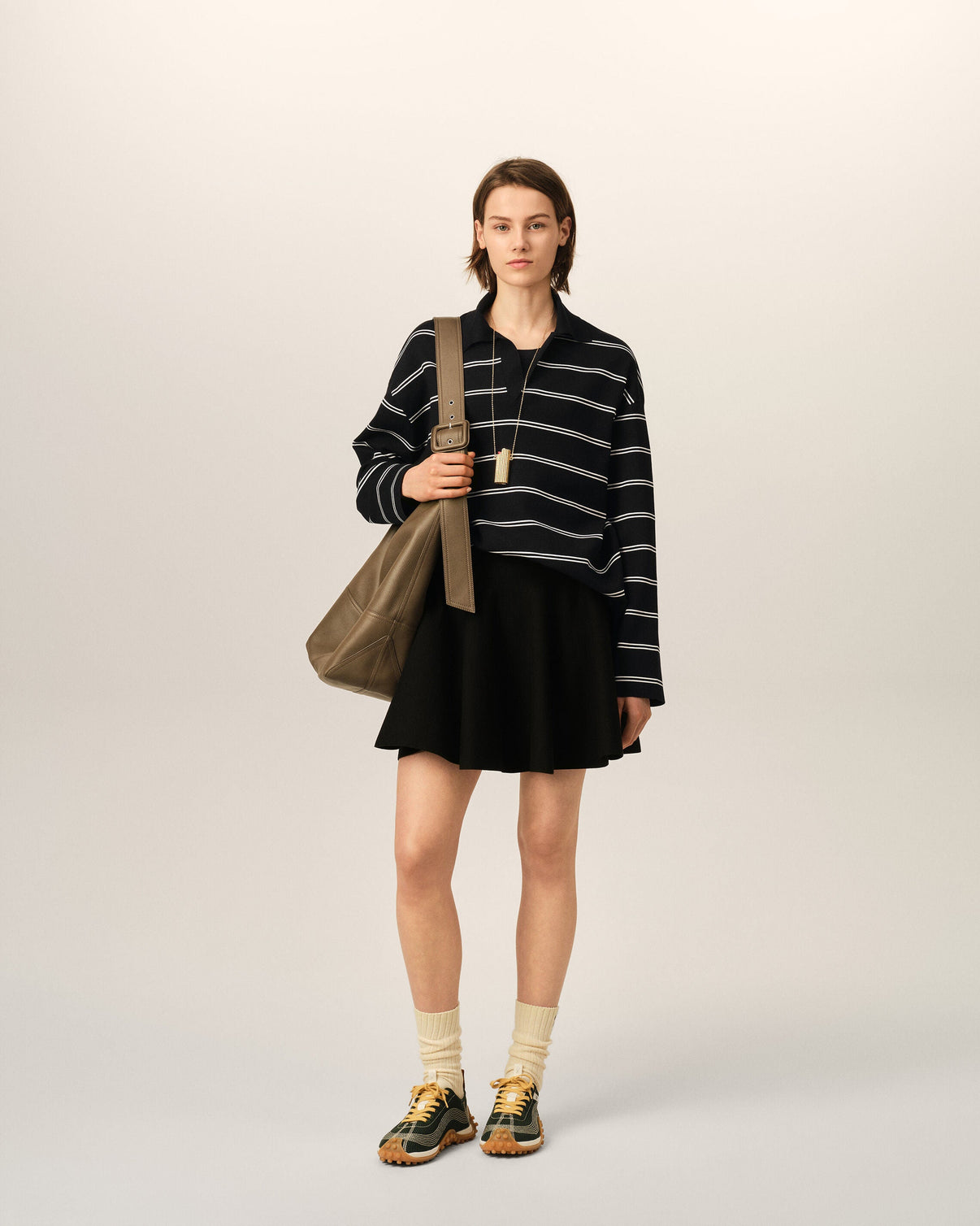 Black striped cotton polo with patch