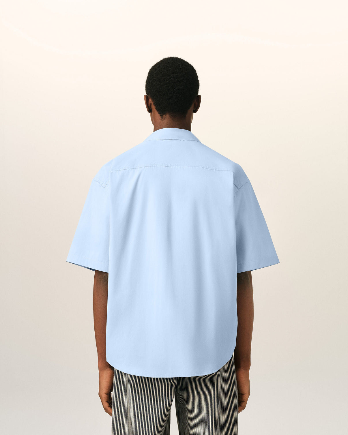 Blue boxy cotton short-sleeve shirt with tulip