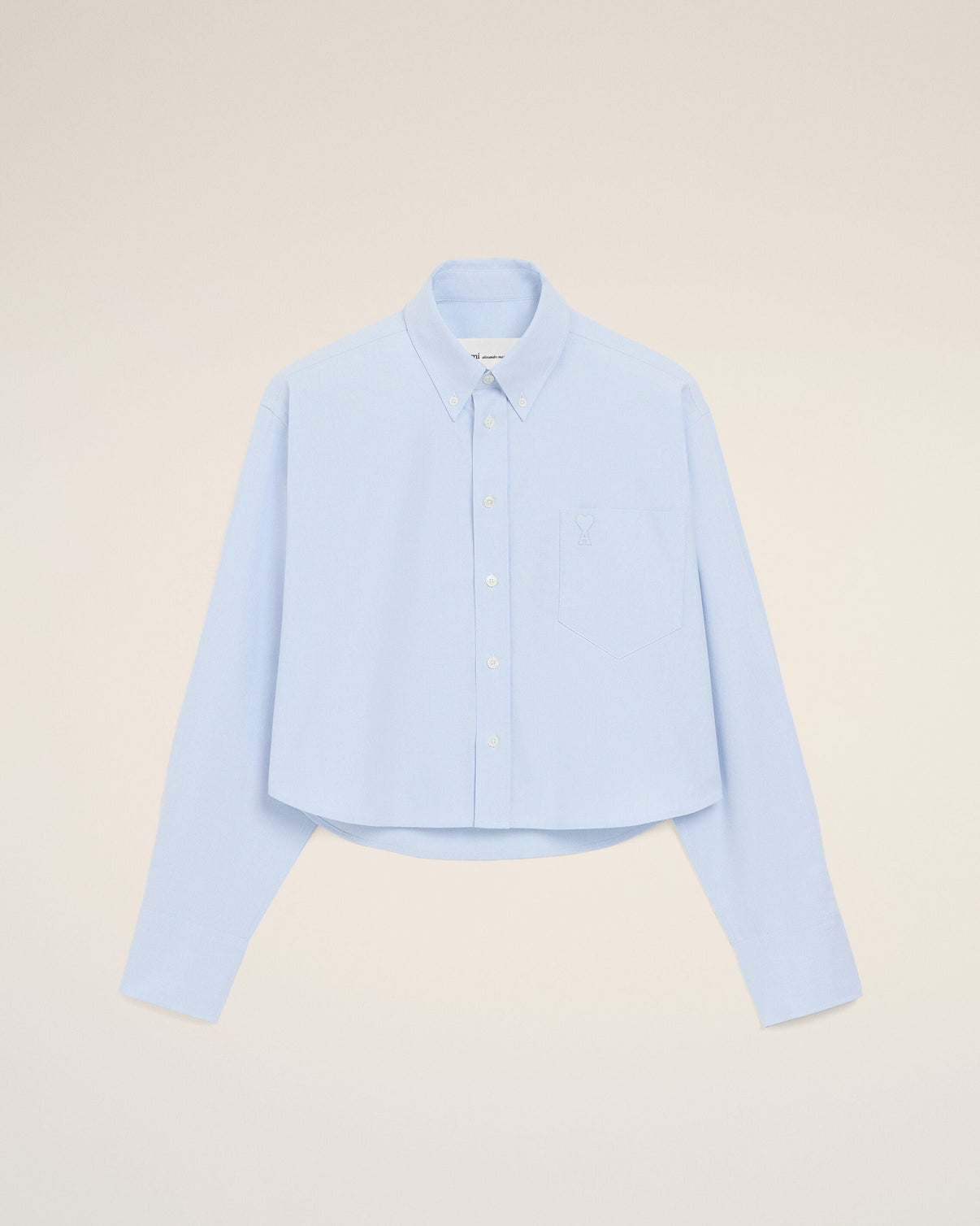 Blue cropped cotton shirt with embossed