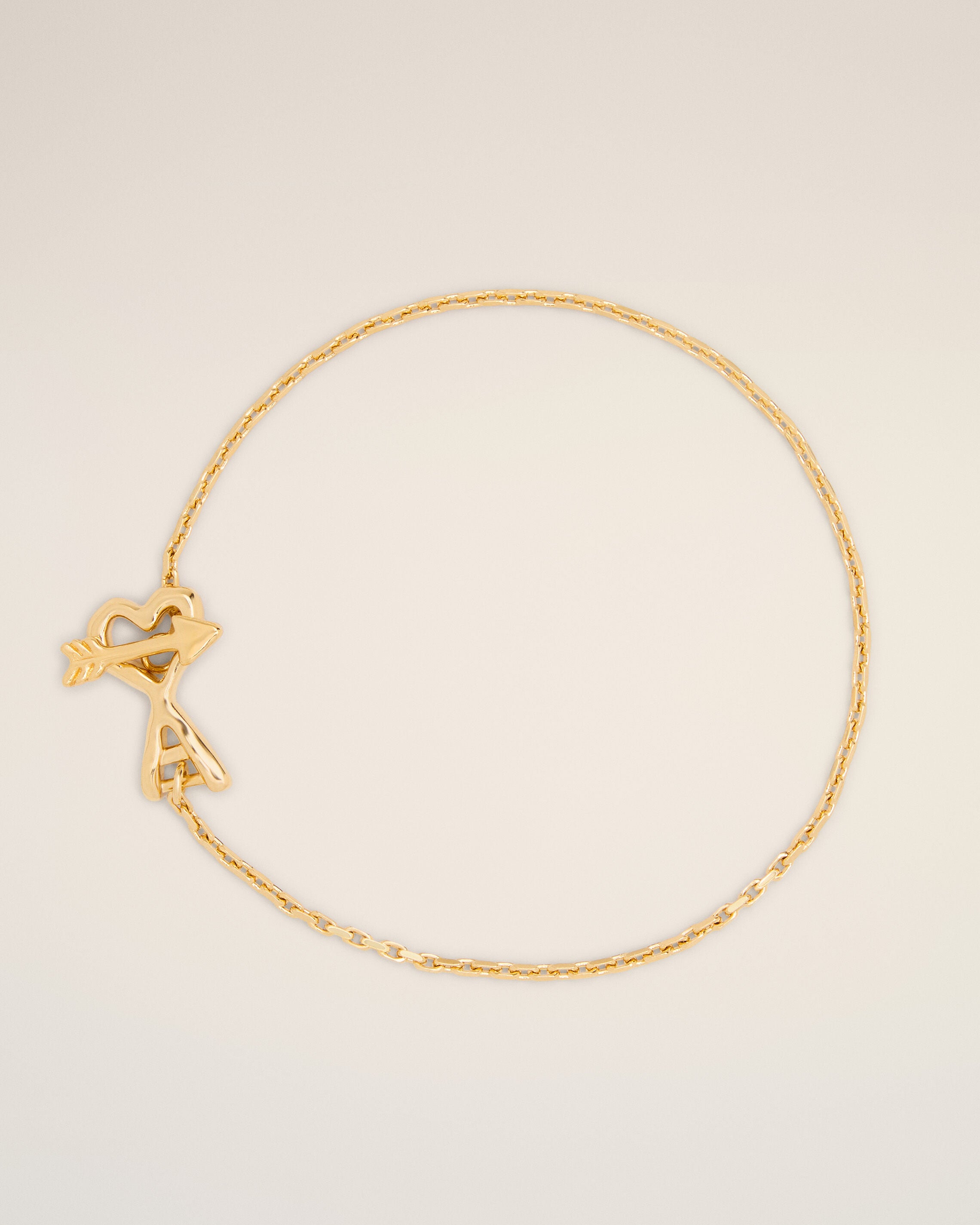 Gold brass bracelet with hammered heart arrow