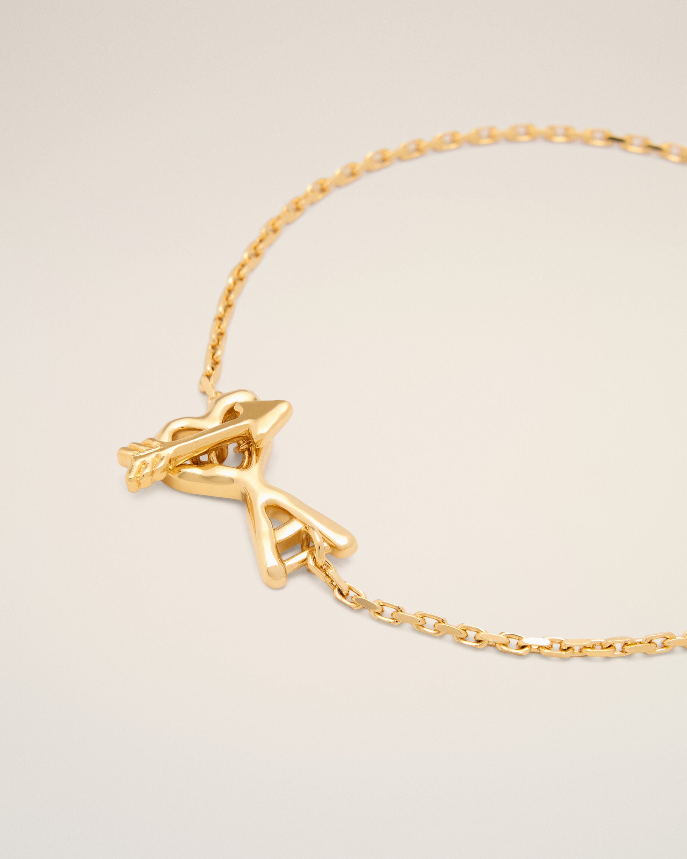 Gold brass bracelet with hammered heart arrow