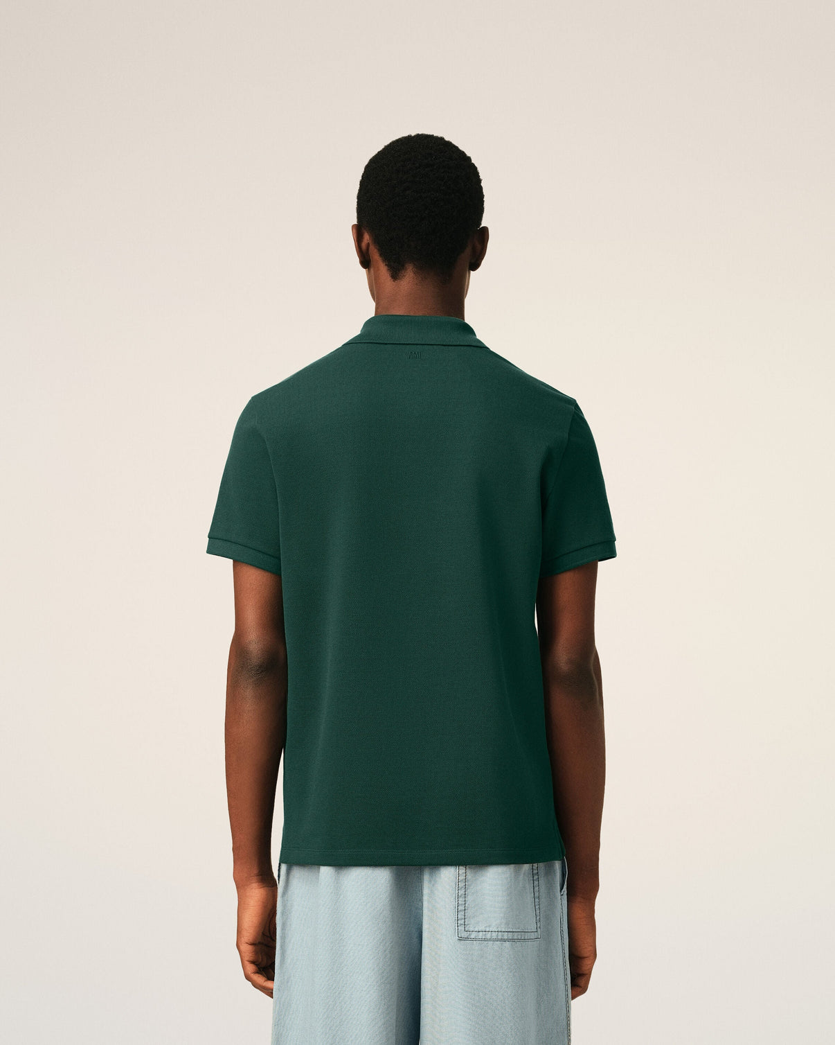 Green cotton polo with