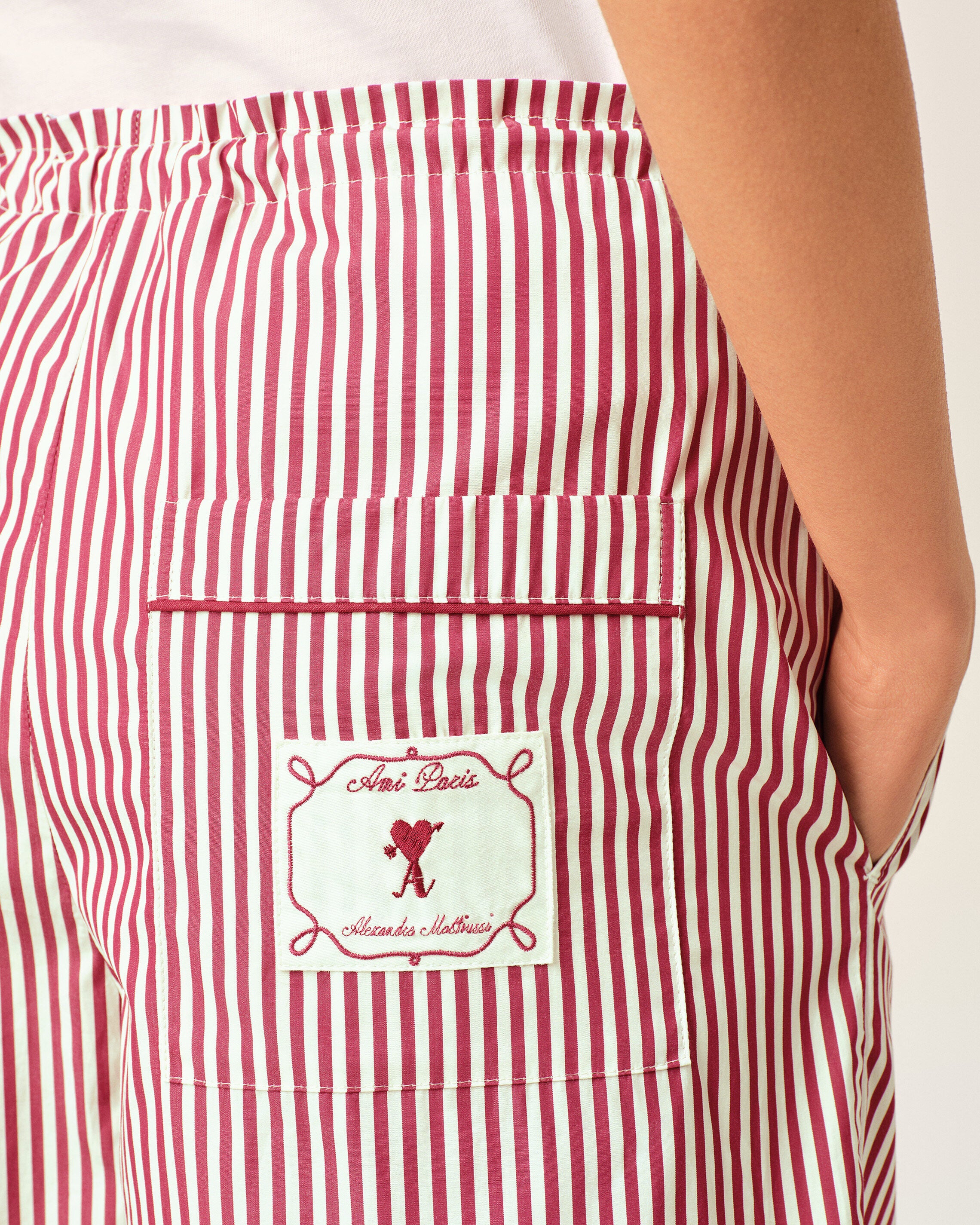 Red striped cotton shorts with heart arrow