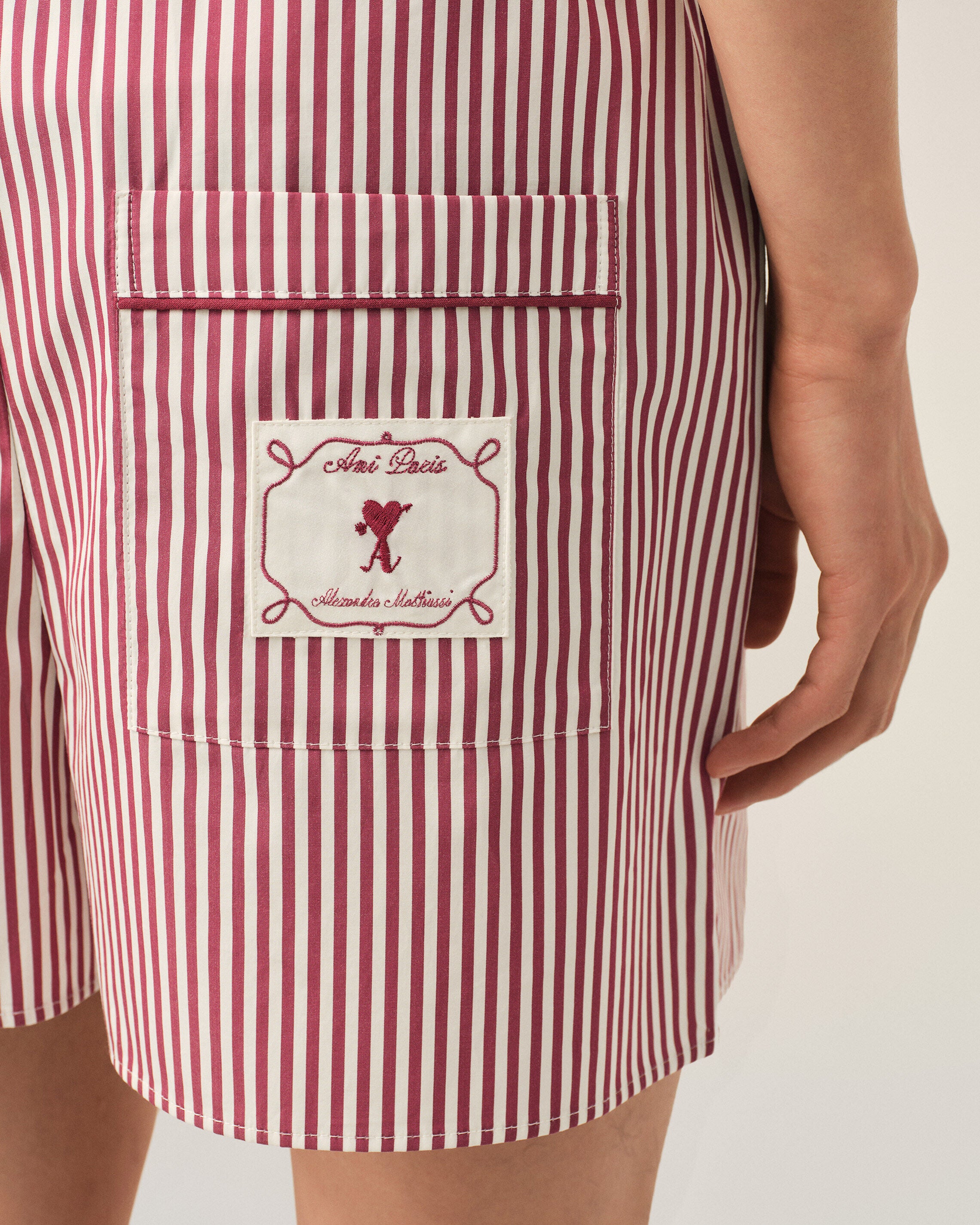 Red striped cotton shorts with heart arrow