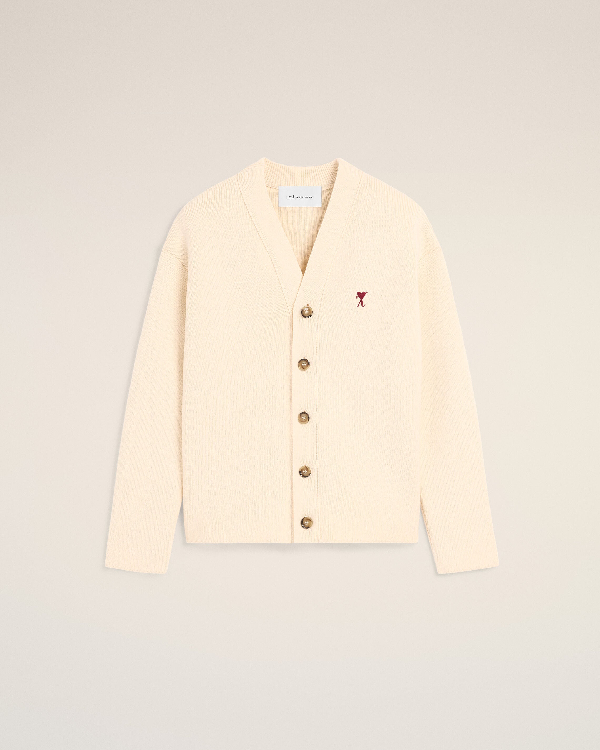 White cotton and wool cardigan with heart arrow