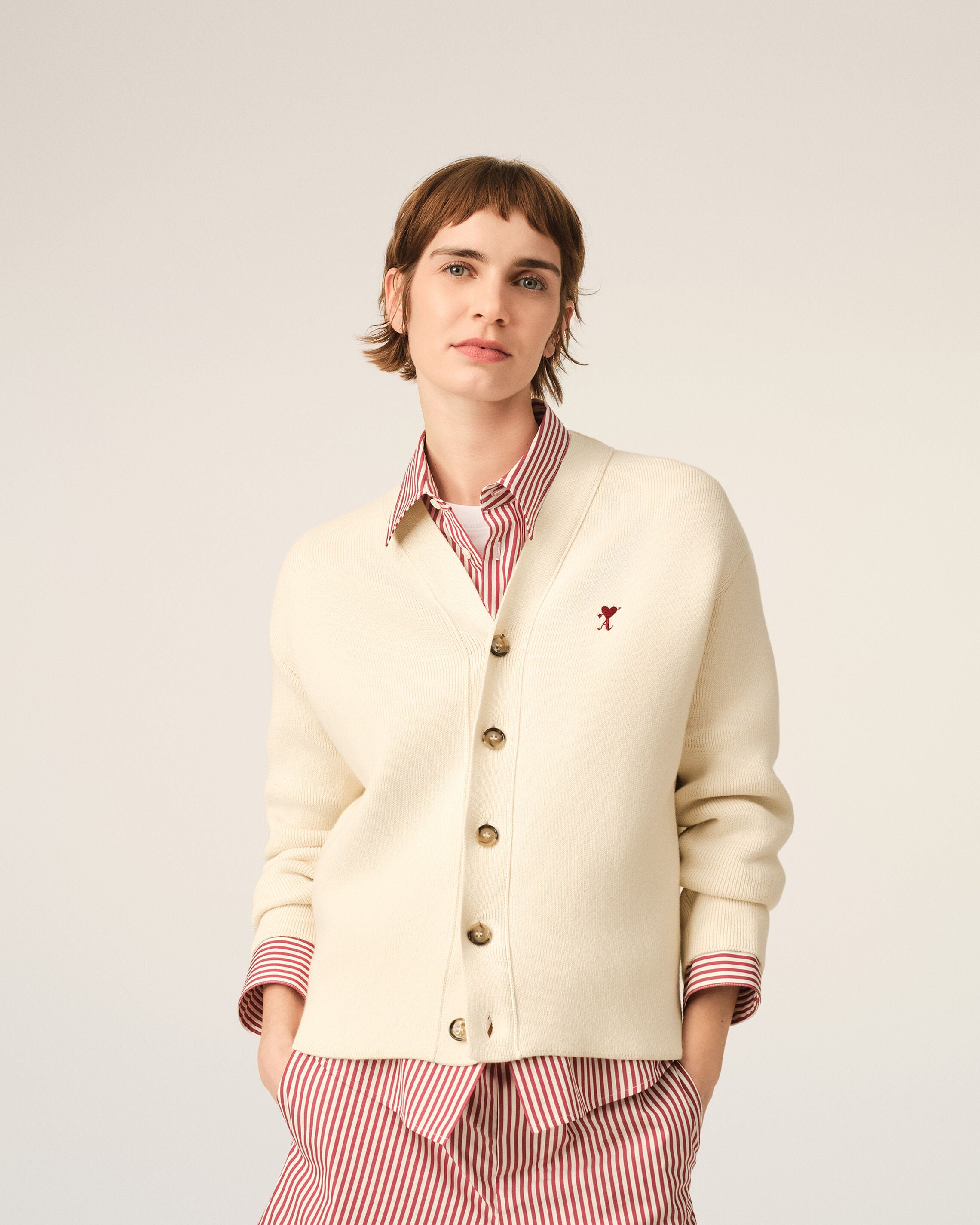 White cotton and wool cardigan with heart arrow