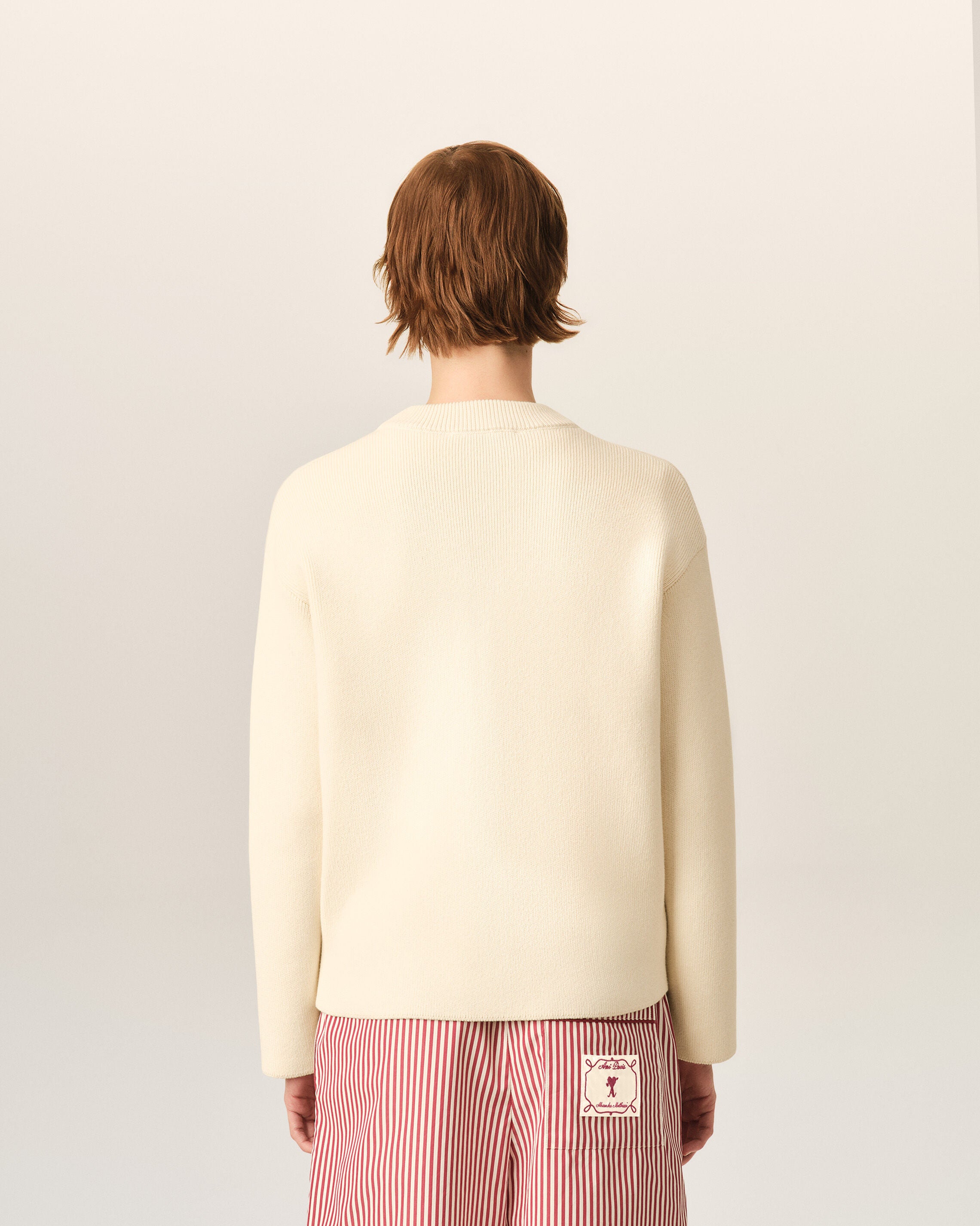 White cotton and wool cardigan with heart arrow