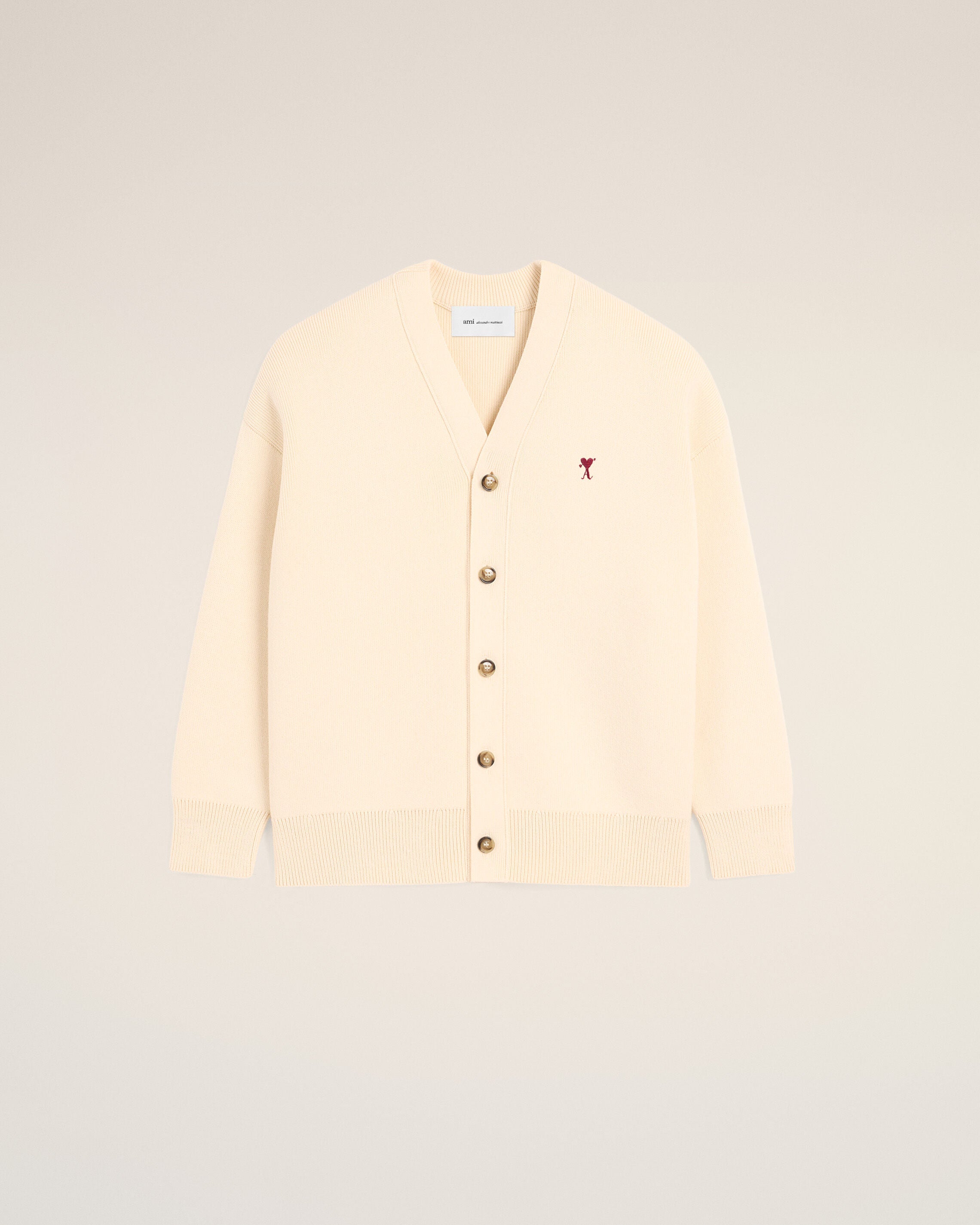 White cotton and wool cardigan with heart arrow