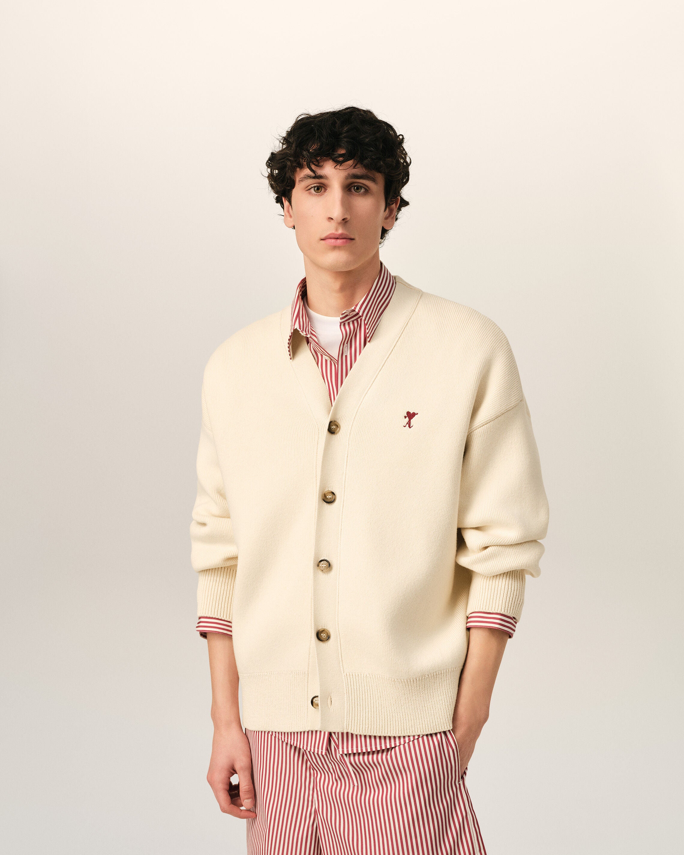 White cotton and wool cardigan with heart arrow