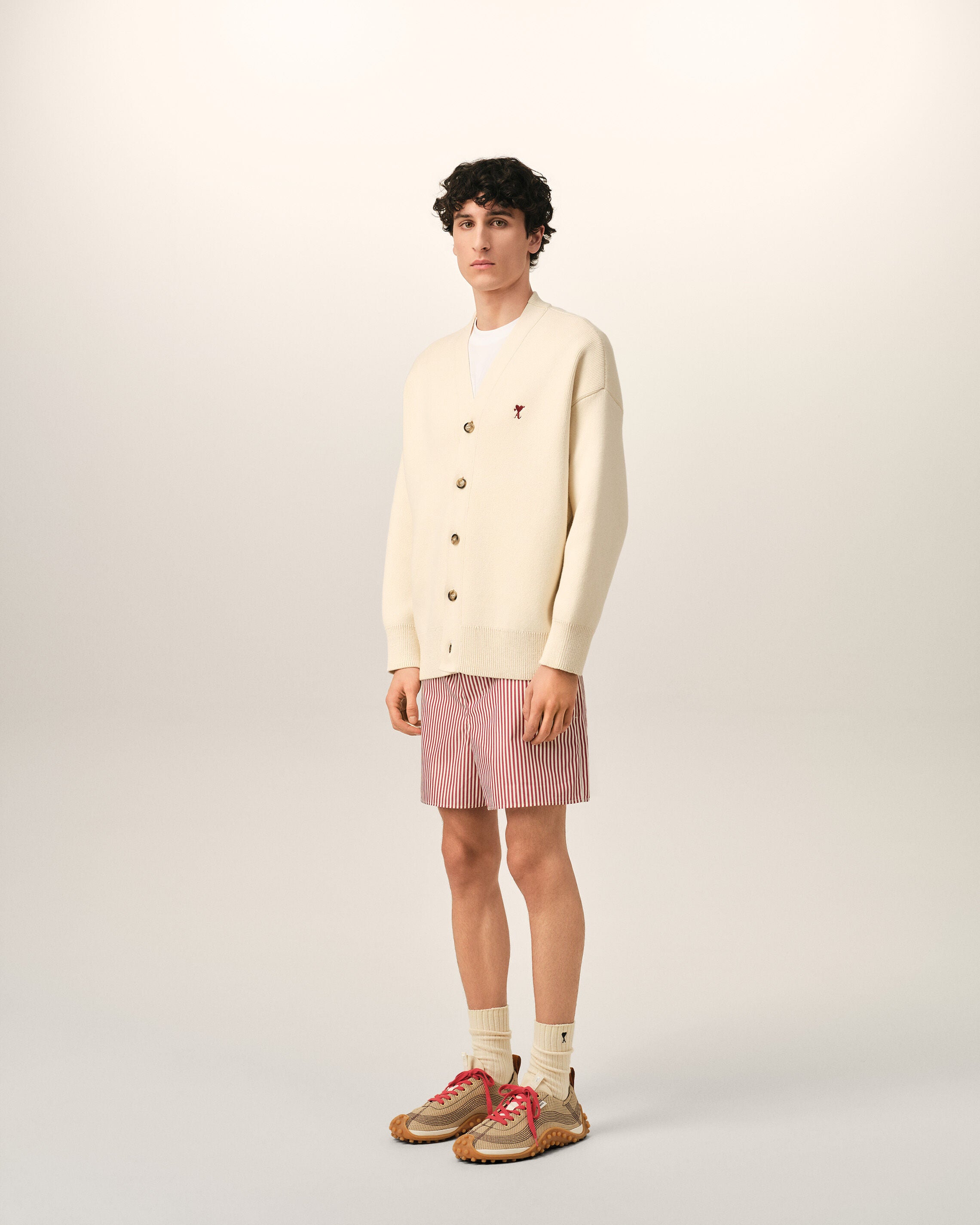 White cotton and wool cardigan with heart arrow