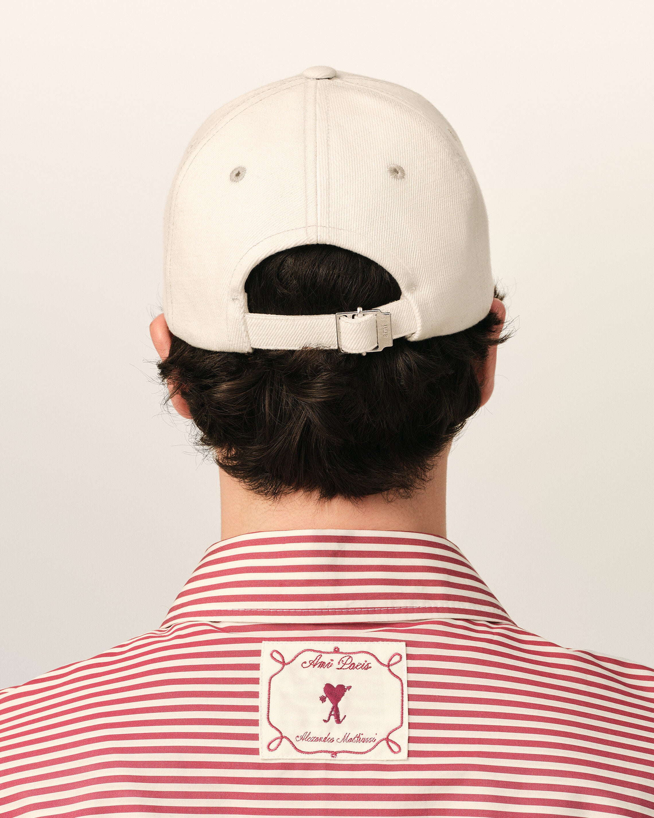 White cotton cap with heart arrow
