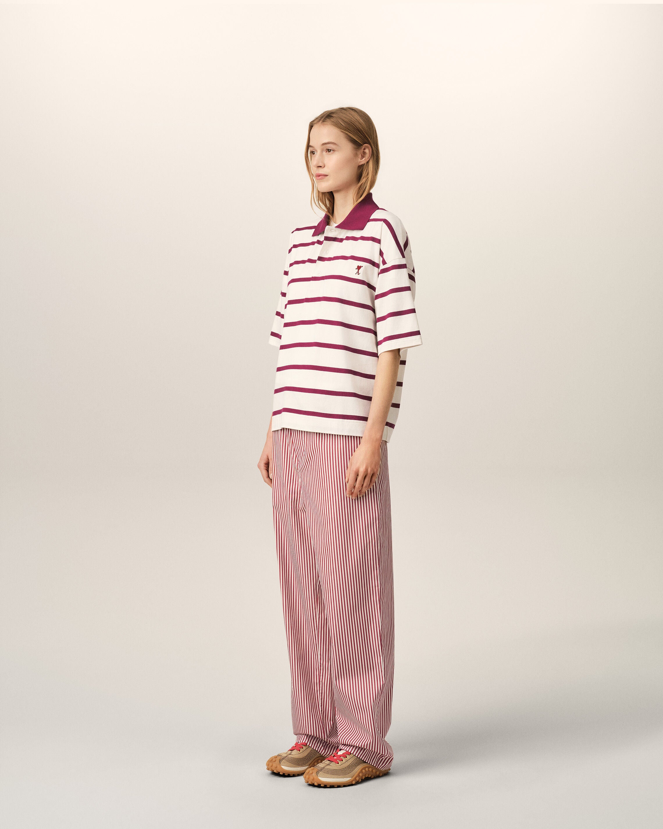 White cotton polo with heart arrow