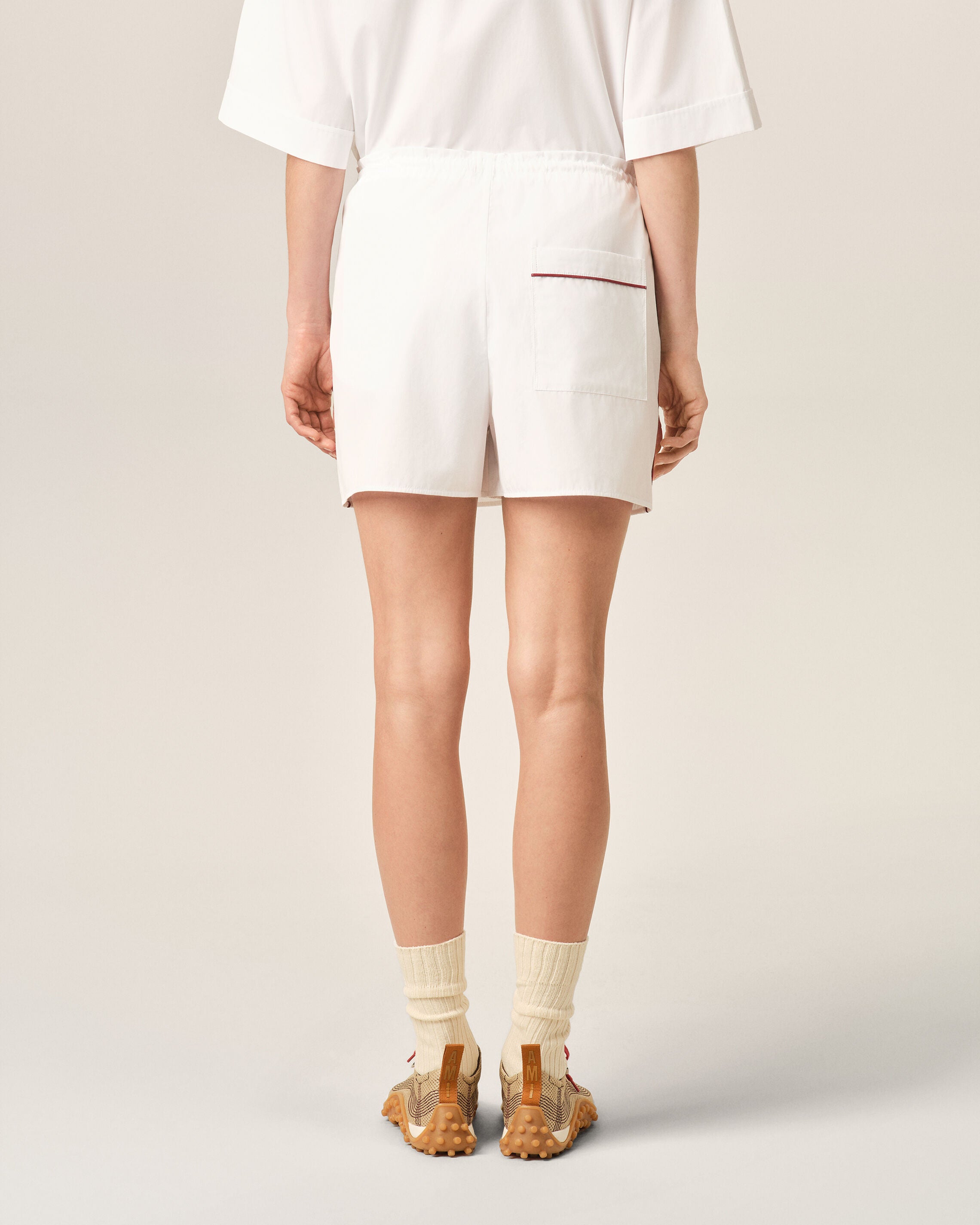 White cotton shorts with heart arrow