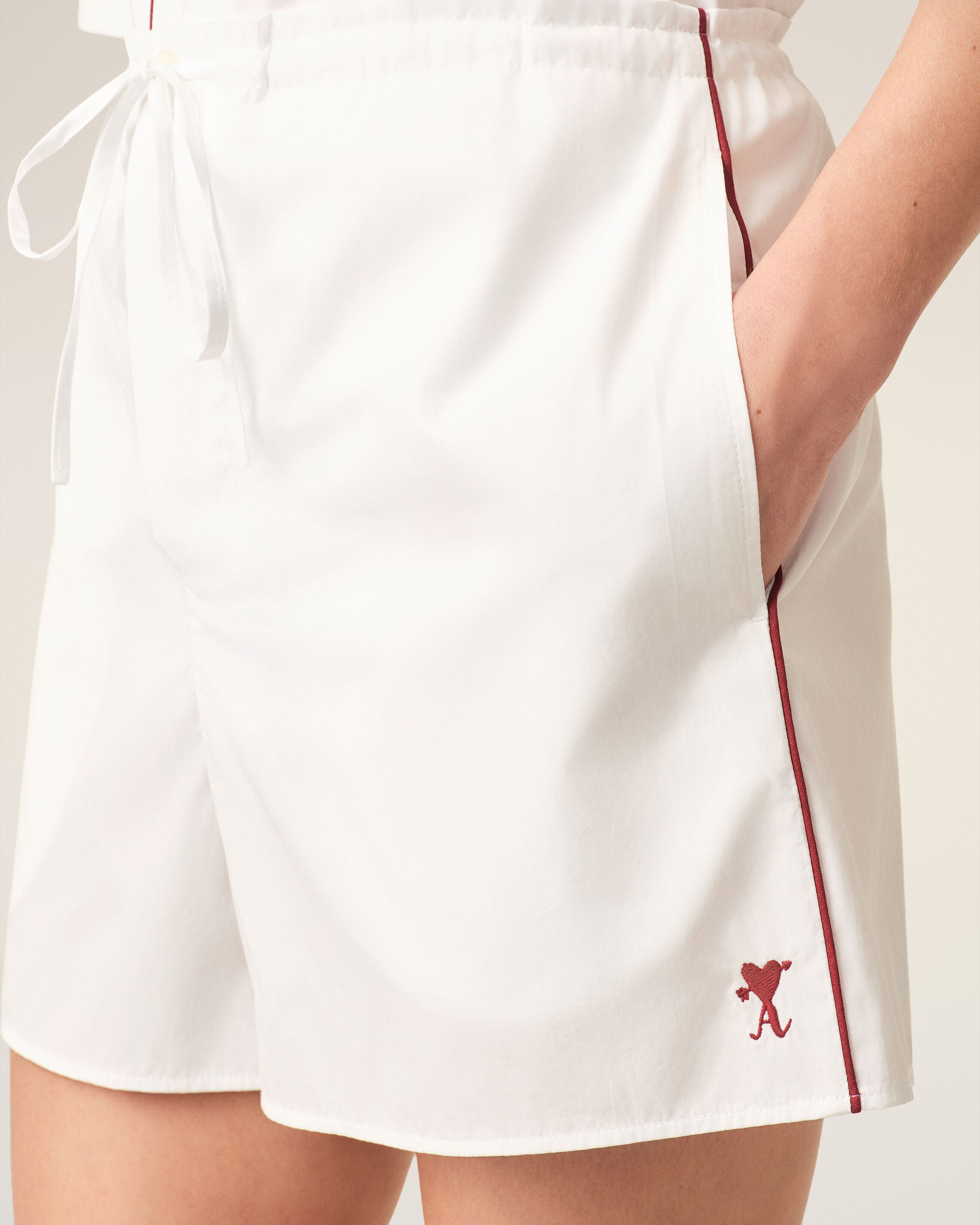 White cotton shorts with heart arrow